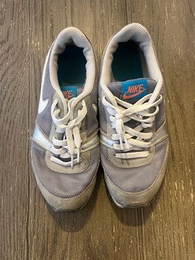 Nike Gray Mesh Sneakers with White Accents and Teal Insole